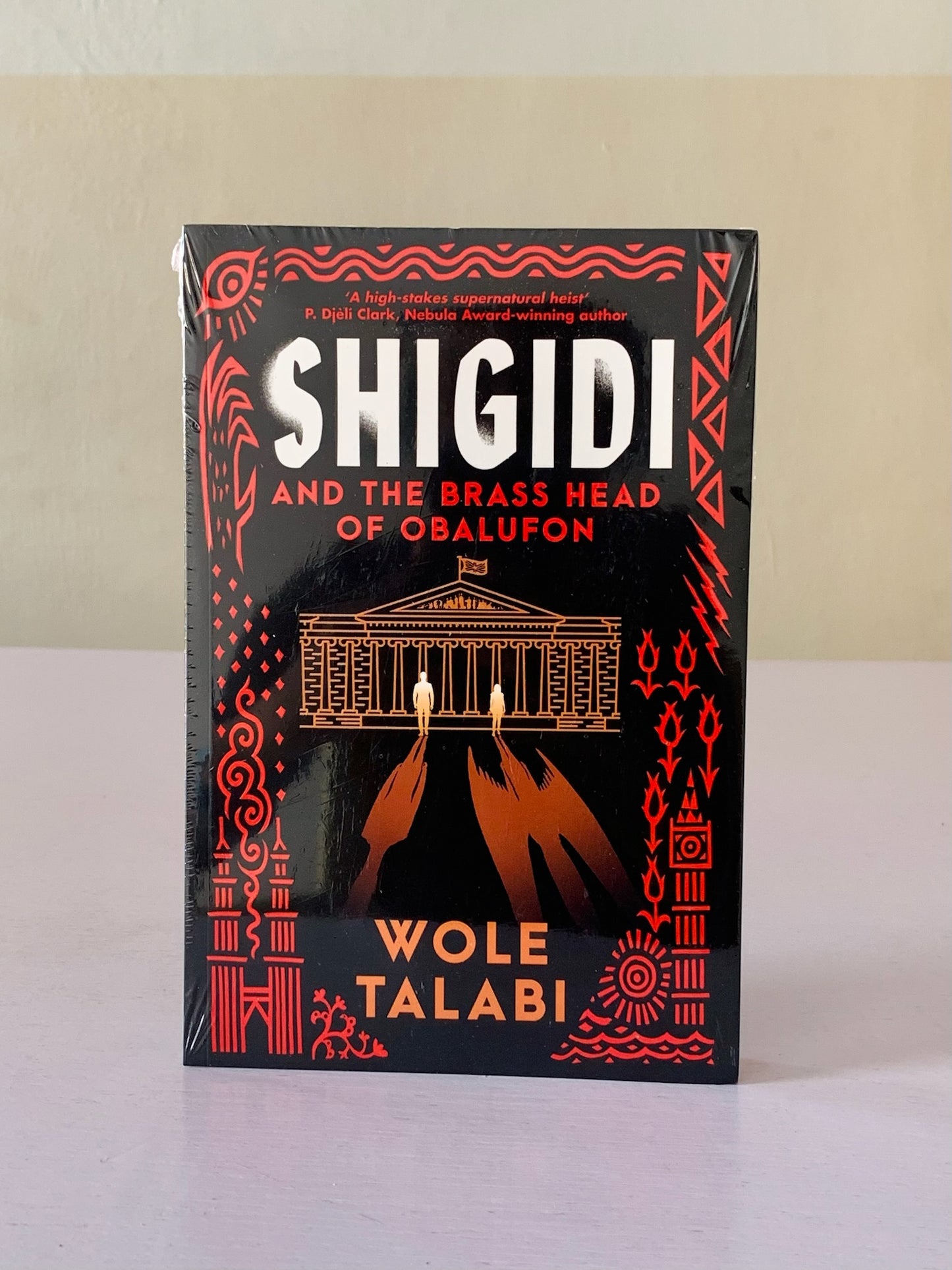 Shigidi and the brass head of Obalufon